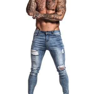 Gingtto muscle fit ripped jeans size 32 light blue.